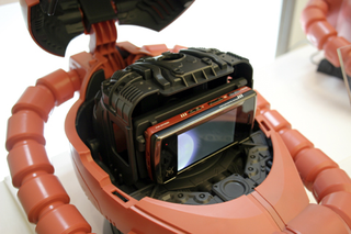 Illustration for article titled Japan Gets a Zaku 2-Style Helmet Phone from Sharp and Softbank